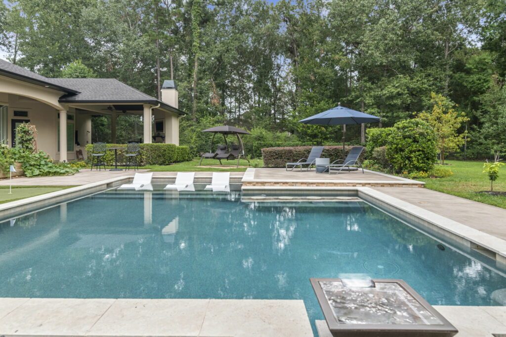 Geometric Pool with Mini Putting Green in Benders Landing Estates of Spring, Texas