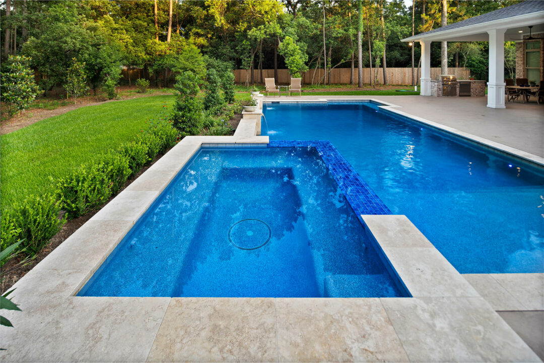 Geometric Travertine Paver Pool in Benders Landing Estates of Spring, Texas