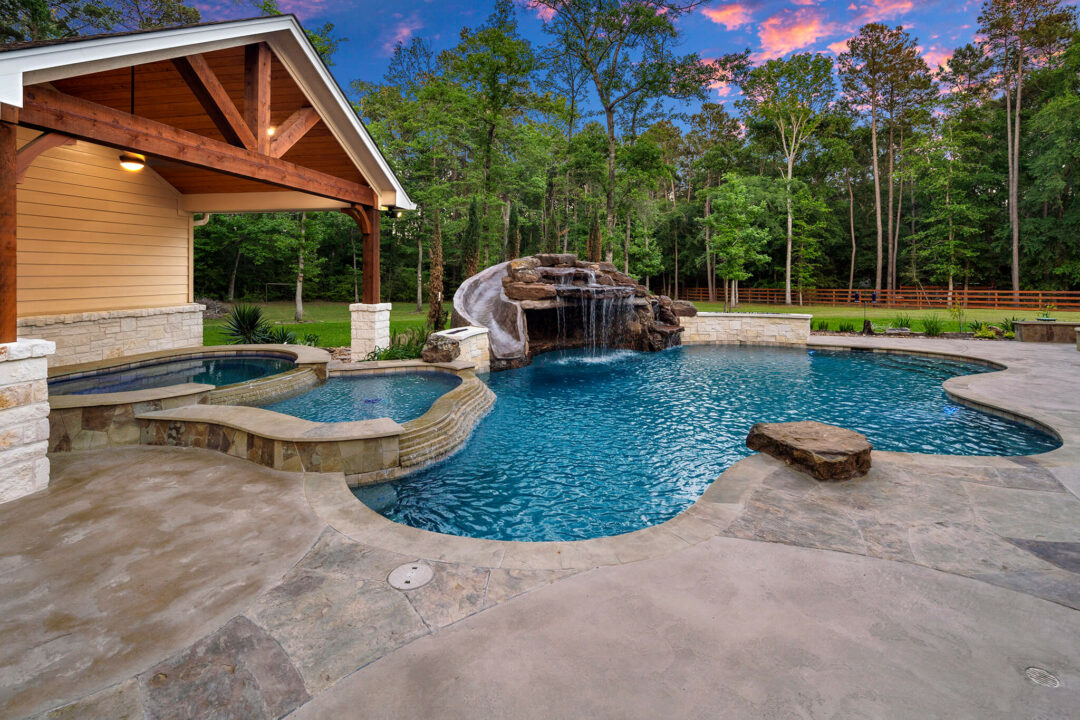 Freeform Pool, Slide, and Grotto in Lake Windcrest of Tomball, Texas