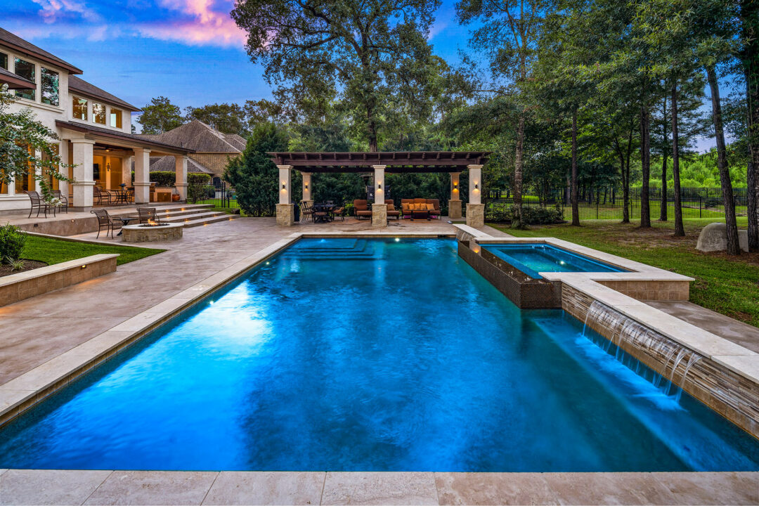 Geometric Pool and Outdoor Living Space with Pergola in Benders Landing Estates of Spring, Texas