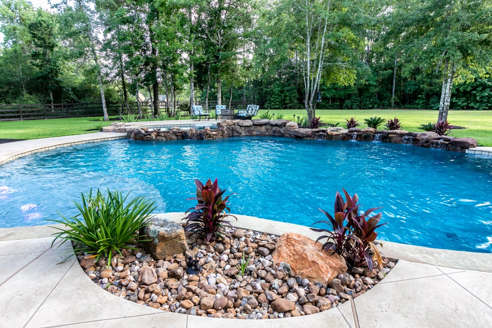 Freeform Pool with Stone Waterfall in High Meadow Ranch of Magnolia, Texas